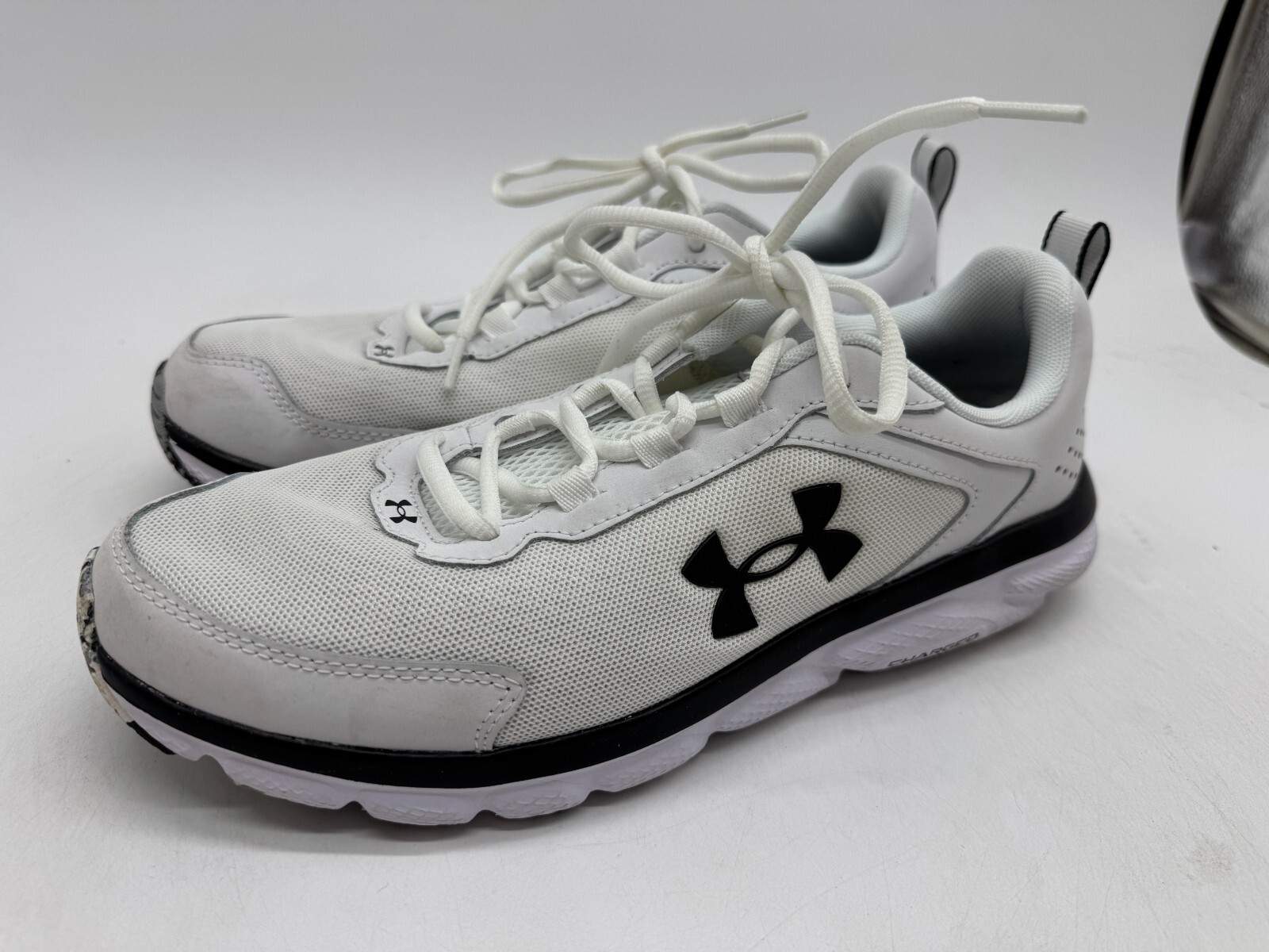 UNDER ARMOUR MEN’S CHARGED ASSERT 9 MARBLE RUNNING SHOE WHITE BLACK SIZE 10