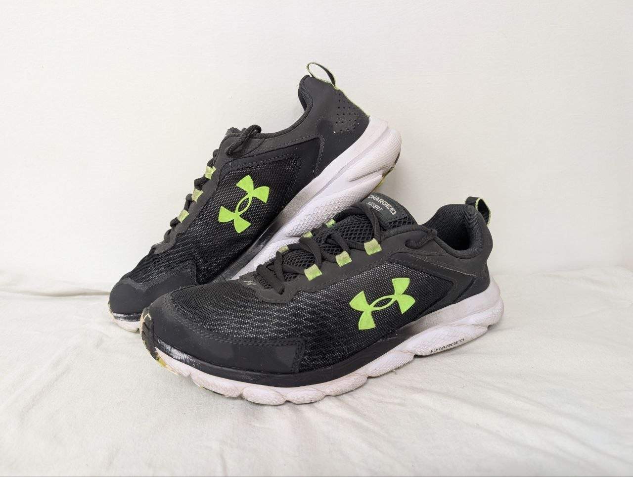 Size 10 – Under Armour Charged Assert 9 Gray. Used good condition