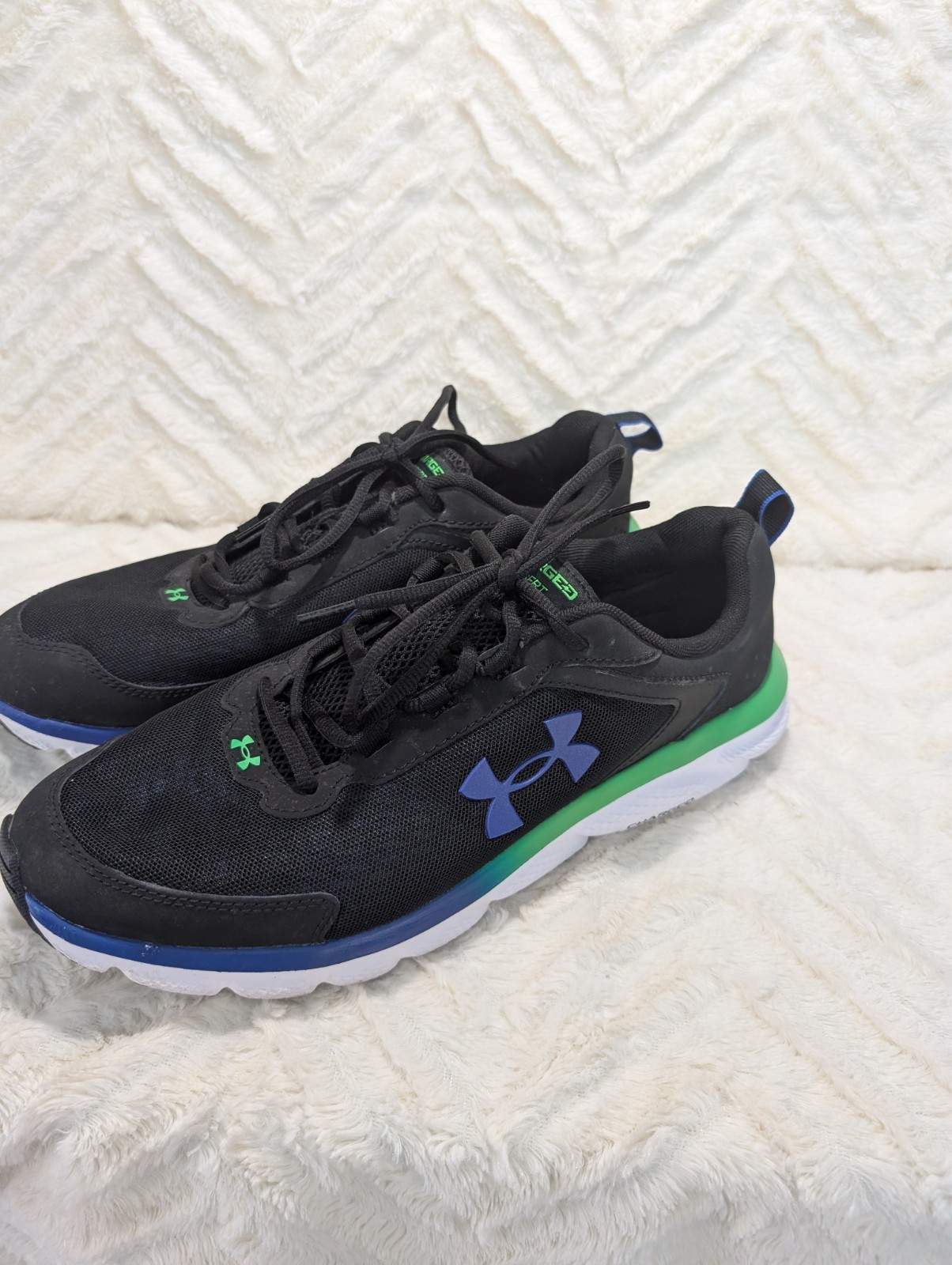 S1 Under Armour Men’s Charged Assert 12 Running Black/Extreme Green