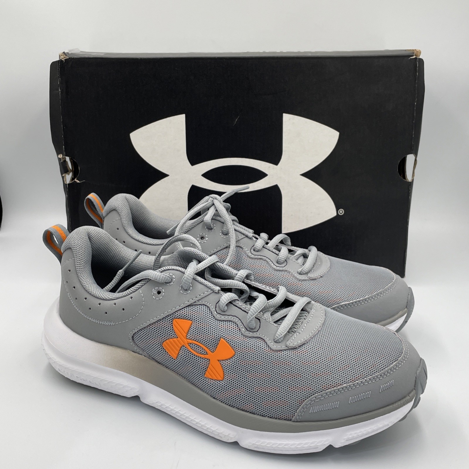 Under Armour UA Charged Assert 10 Shoes Gray / Orange Mens Size 8 NEW