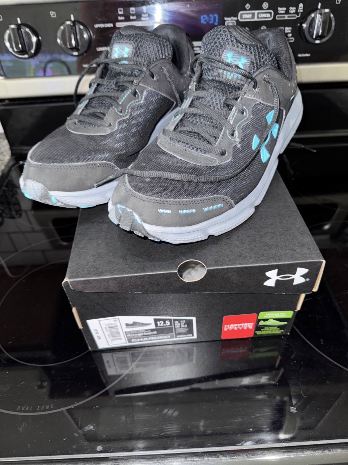 Men’s Black/Blue Under Armour Charged Assert 10 – Size 12.5M