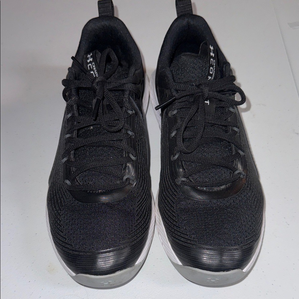 Under Armour Charged Commit Men’s Black and White Athletic Shoes 8.5
