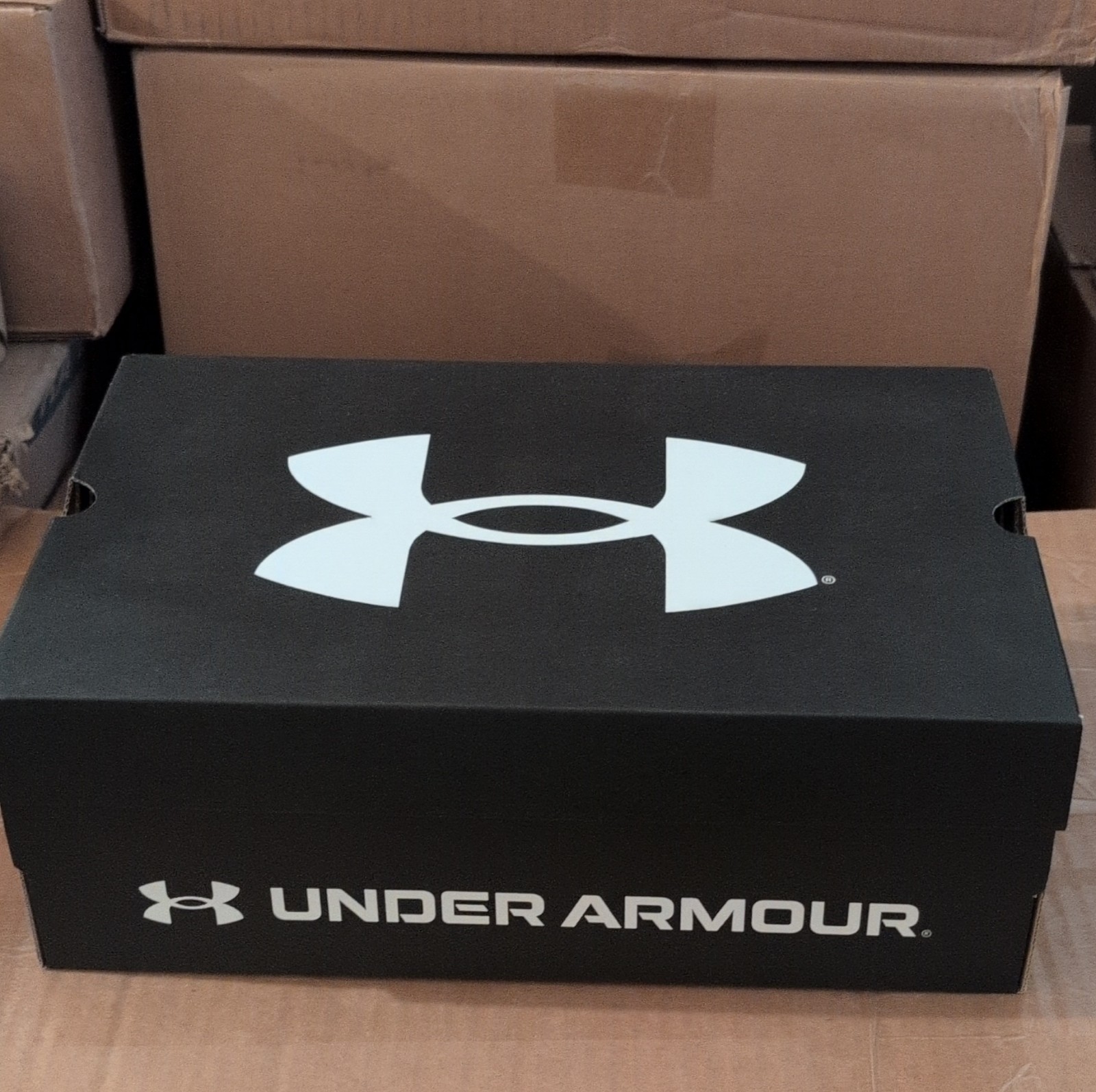 Under Armour UA Charged Surge 4 Black White Mesh Upper Low Top Sneaker