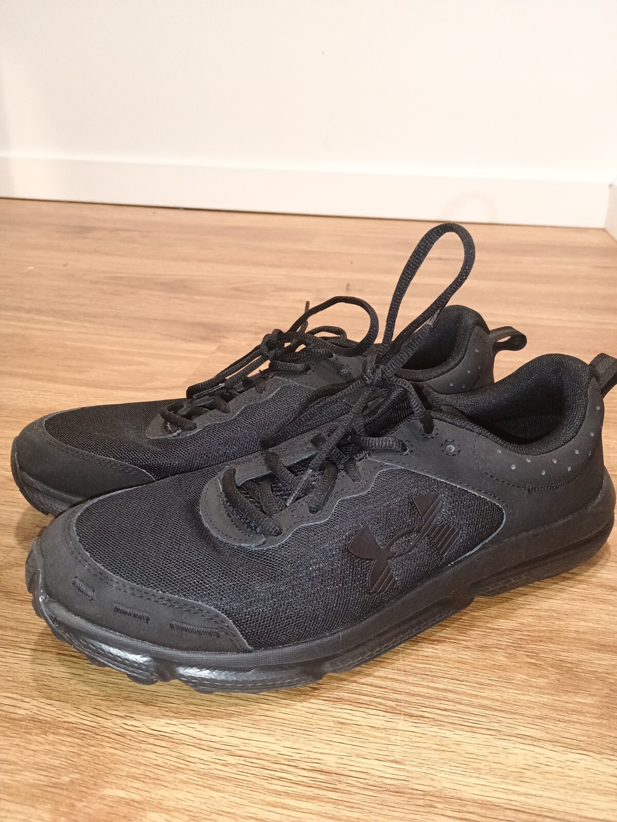 Size 11 – Under Armour Charged Assert 10 Triple Black