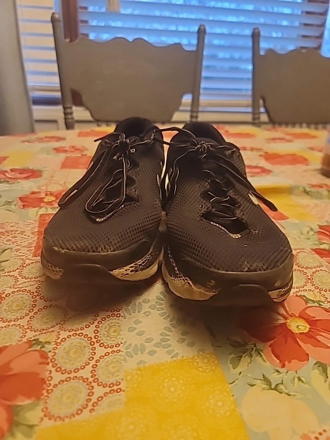 black under Armour running shoes