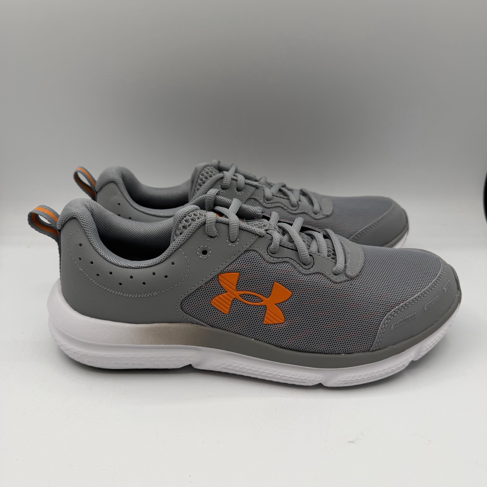 Under Armour UA Charged Assert 10 Shoes Mens 12 Grey/Orange Running Sneakers