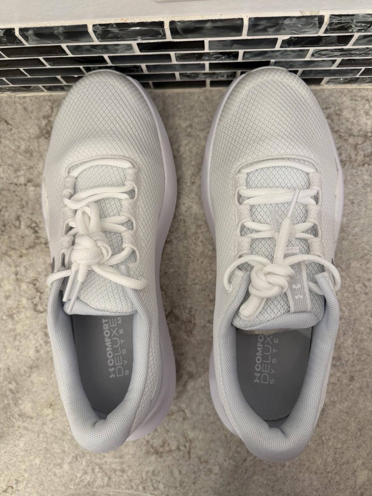 New-  Under Armour Charged Surge 4 running shoes in white