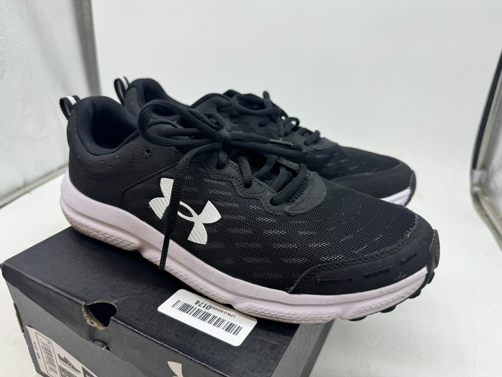 Under Armour Charged Assert 10 Sneaker Men’s Black White Athletic Shoes – 12